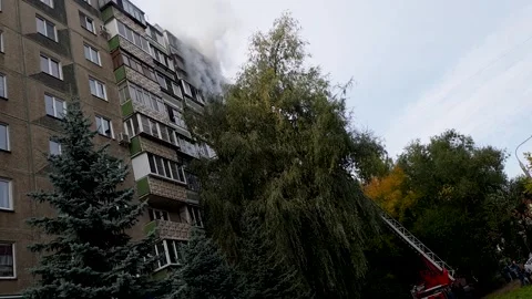 A strong fire in a residential multi-storey building with the help of a fir.. Stock Footage 251956626