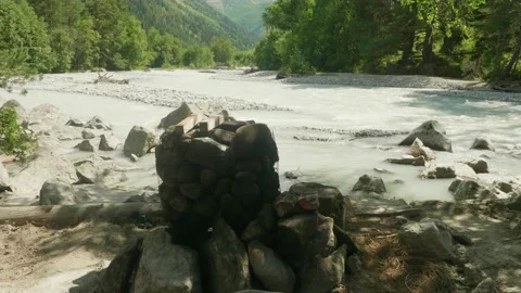 Strong flow of deep mountain river with the clearest water with green shores on Video stock 140002838