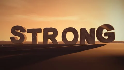 Strong Giant Eroded Stone Letters Standing in a Desert at Sunset with Stock Footage 342221882
