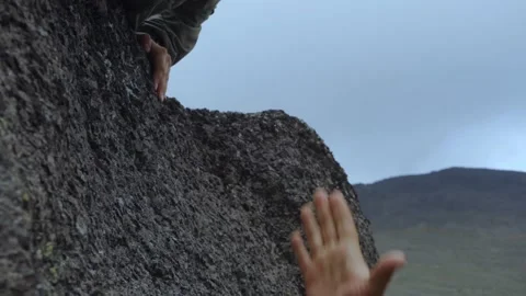 Strong hand grip. Support and mutual assistance Stock Footage 166603981