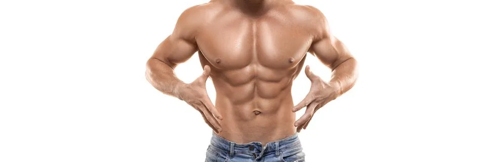Strong healthy athletic man in jeans. Male torso isolated on white. Stock Photos
