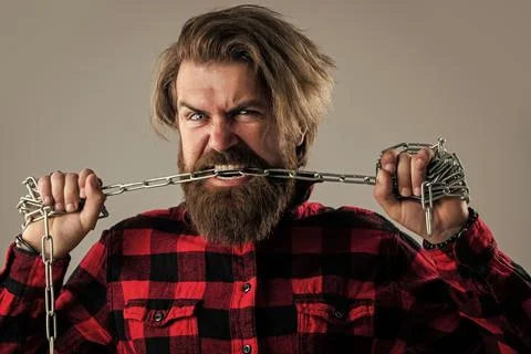 Strong jaw. man chained problems. liberation from slavery. perfect male charisma 스톡 사진