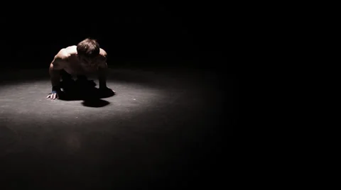 Strong male athlete does push-ups. Wide shot. Stock Footage 33866852
