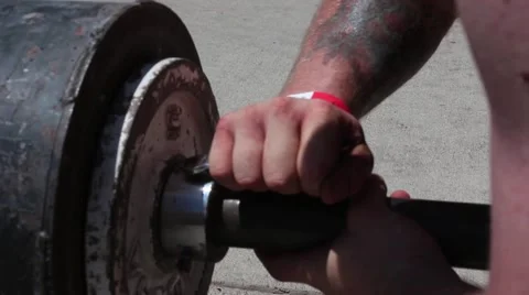 Strong Man Attatching clip CU Stock Footage 68797795