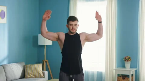 Strong Man Is Doing Arm Circles Stock Footage 135535478