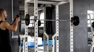 Strong man doing barbell Stock Footage 86075830
