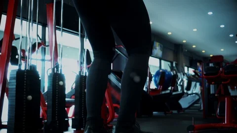 Strong man doing lifting his body on the simulator Stock Footage 90029376