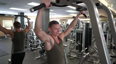 Strong Man Doing Pull-Ups On A Bar Stock Footage 66435365