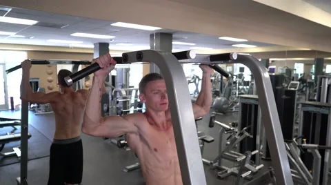 Strong Man Doing Pull-Ups On A Bar Stock Footage 66435415