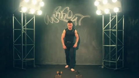 Strong man doing sport exercises Stock Footage 78347710