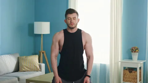 Strong Man Is Getting Ready to Training Stock Footage 135315586