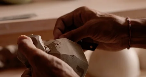 Strong man hands working with raw clay. Work close-up. Stock Footage 127394792
