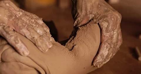 Strong man hands working with raw clay. Work close-up. Stock-Footage 127397728