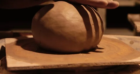Strong man hands working with raw clay. Work close-up. Stock Footage 127398968