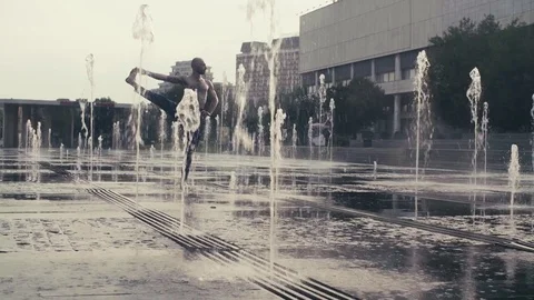 Strong man performing one-leg standing balance Stock Footage
