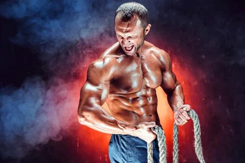 Strong man with rope Stock Photos