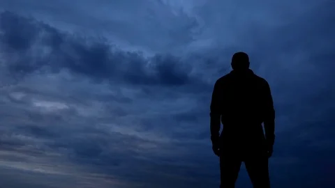 Strong man on the top of the world Stock Footage 76450004