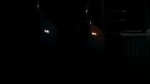 Strong man in training with a hammer and wheel Stock Footage 89604485