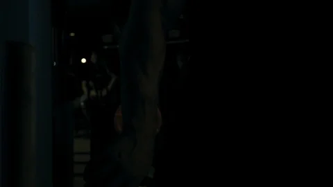 Strong man in training with a hammer and wheel Stock Footage 89604489