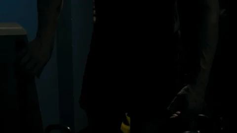 Strong man in training with a hammer and wheel Stock Footage 89604493