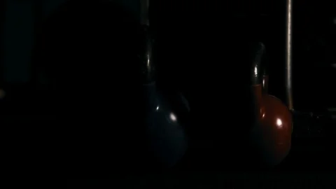 Strong man in training with a hammer and wheel Stock Footage 89604792