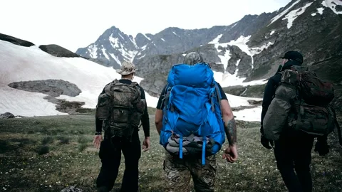 Strong men climb the mountains Stock Footage 138691464