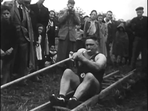 Strong men exhibit their unworldly strength. Stock Footage 79459977