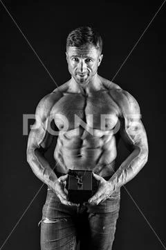 Strong muscles emphasize masculinity sexuality. secret present for valentines Stock Photos
