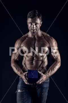 Strong muscles emphasize masculinity sexuality. secret present for valentines Stock Photos