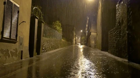 Strong night rain in the main street of the country Stock Footage 88518351