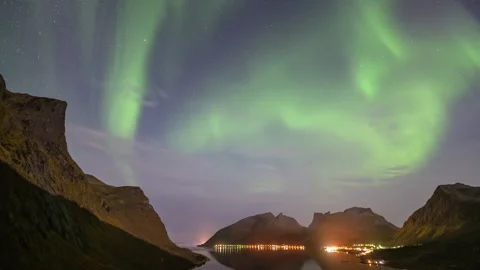 Strong Northern Lights over sharp hills Stock Footage 250444177