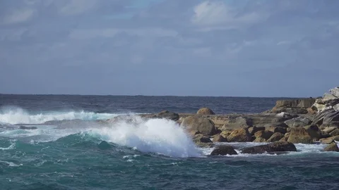 Strong ocean wave hit cliff rock Stock Footage 86170064