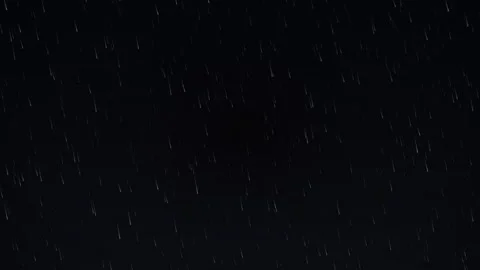 Strong rain at night featuring heavy downpour in dark urban environment Stock Footage 347730530