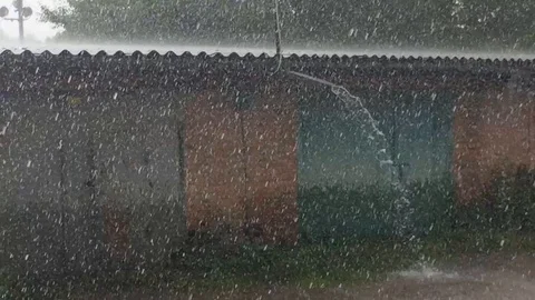 Strong rain on the street Stock Footage 95841956