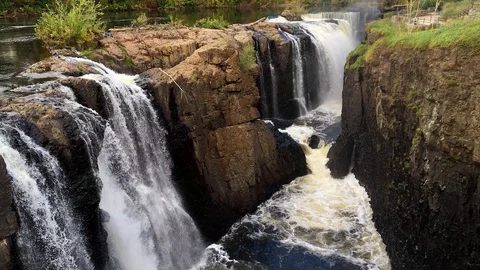 Strong River Currents Cascade Over Waterfalls Stock Footage 98416239