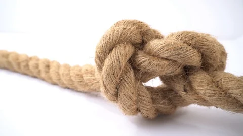 Strong Rope with a Knot isolated on white Background Stock Footage 126940628