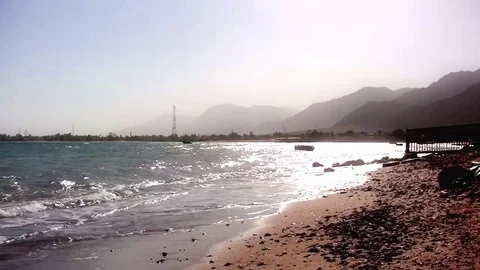 Strong sea waves side view with Sinai mountains in the background Stock Footage 71935250