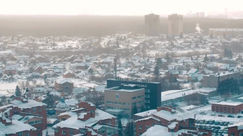 Strong smoke from chimneys in a distant cold Siberian city Stock-Footage 123888392