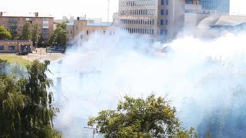 A strong smoke was thrown down after watering Stock Footage 79498531