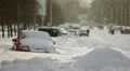 The strong snow cyclonein the city:bad weather,difficult traffic, extreme frost HD Footage