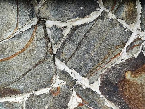 Strong stone wall texture background Stock Photos