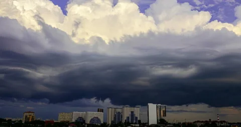 A strong storm cloud flies over the city Stock Footage 159062531