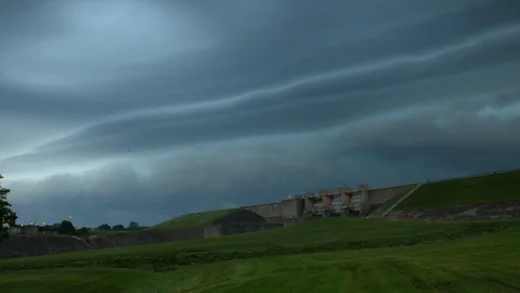 Strong storm front approaching over a dam 2160P Stock Footage 110700022
