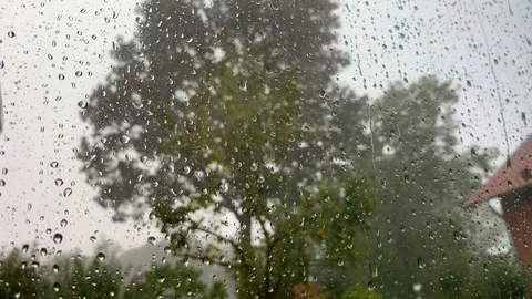 A strong storm rages out from behind the window Stock Footage 118217751