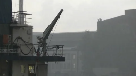 Strong storm with rain and thunderstorms in the seaport. Stock Footage 134407719
