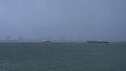 Strong storm with rain and thunderstorms in the seaport. Stock Footage 137448904