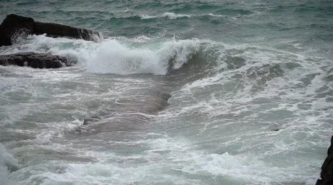 Strong storm surge current washing into inlet Stock Footage 56062001
