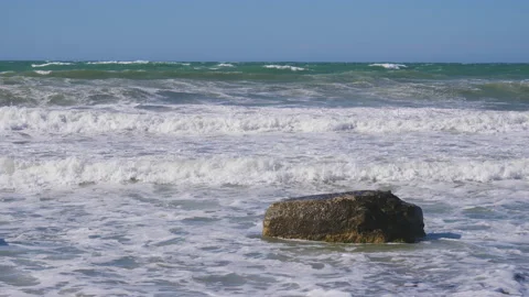 Strong storm waves beating against the breakwater on the waterfront, water sp 動画素材 132837767