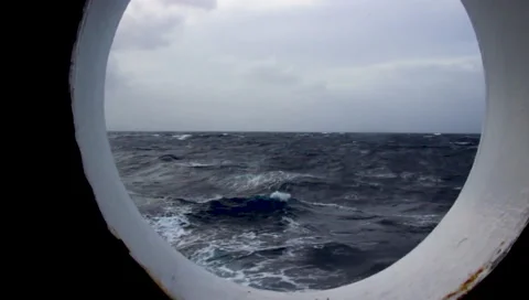 Strong stormy view from the ship's window, high waves, the ship is moving Stock Footage