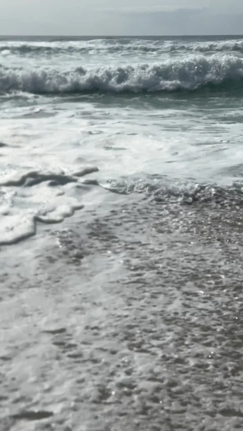 The strong stormy waves crashign on the beach at Sennen Cove, Cornwall. Stock Footage 322073687